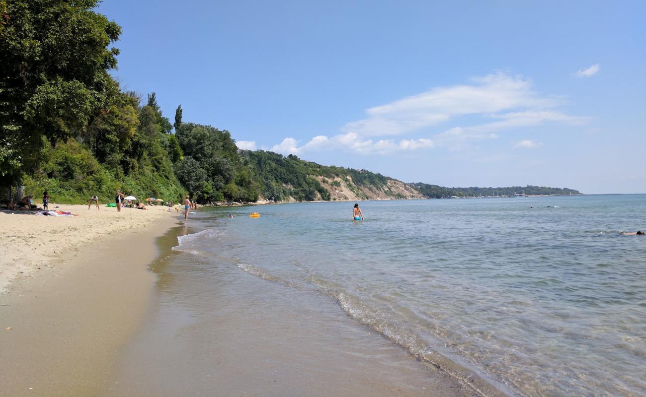 Photo of Hidden beach with bright sand & rocks surface