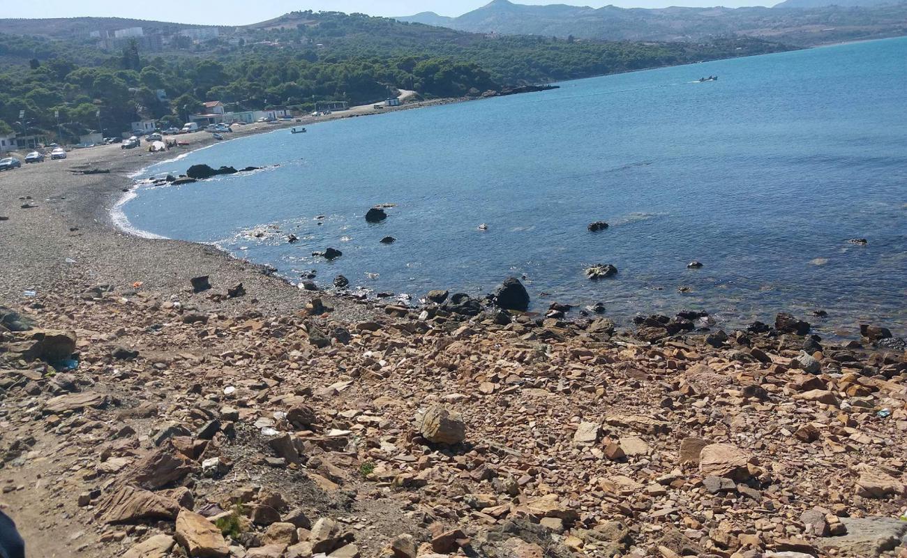 Photo of Plage de Beni Haoua with rocks cover surface