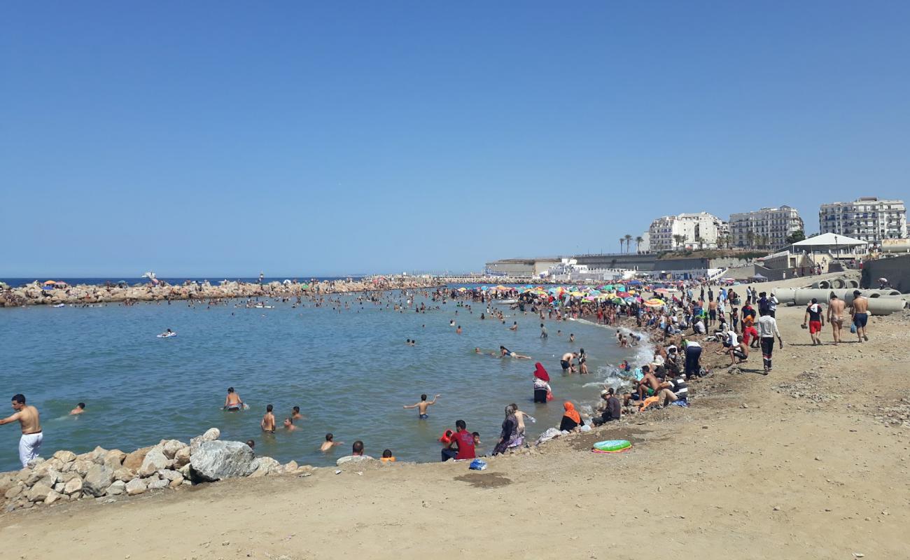 Photo of Flaxen beach with bright sand & rocks surface