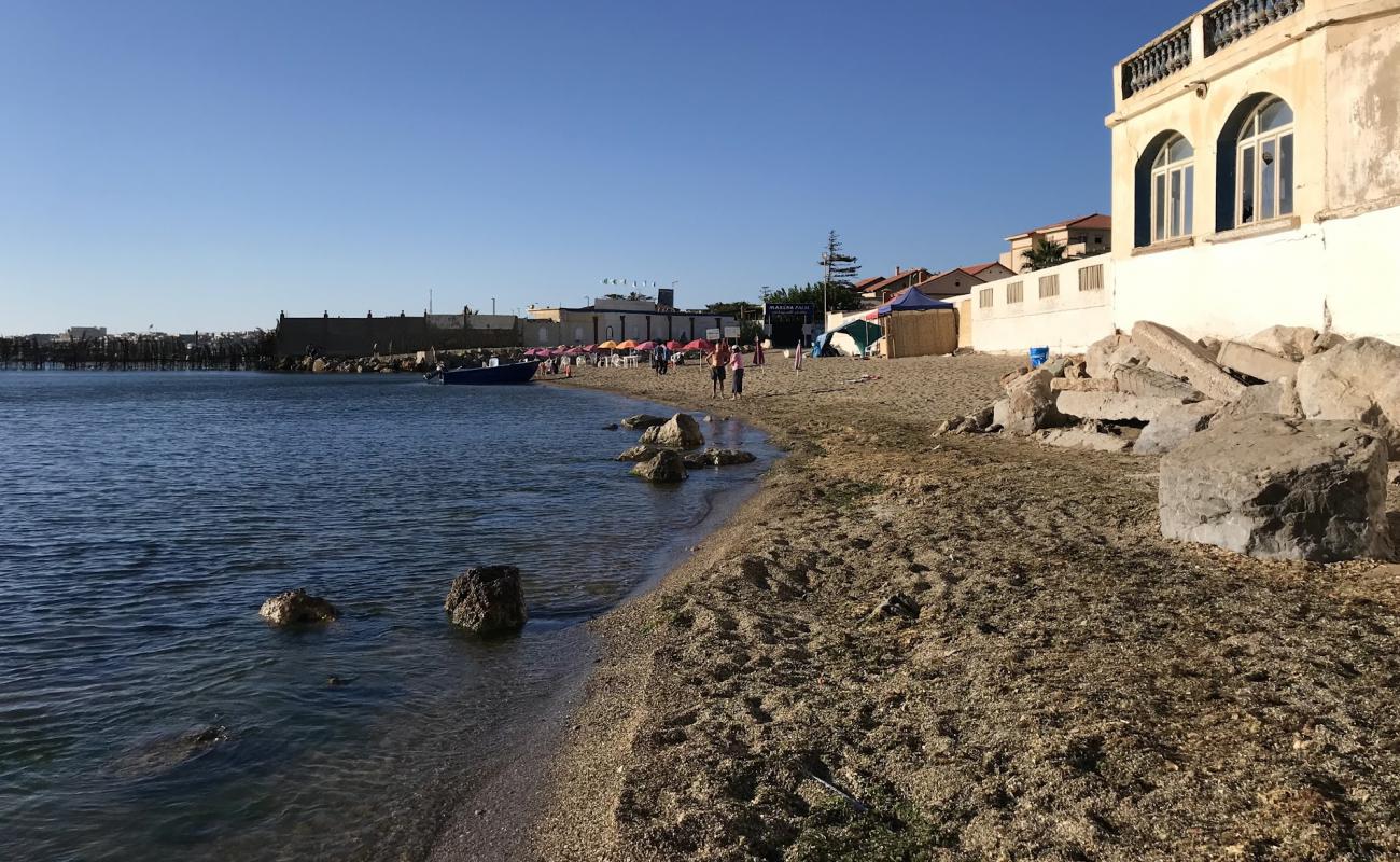 Photo of La Cigogne beach with light fine pebble surface