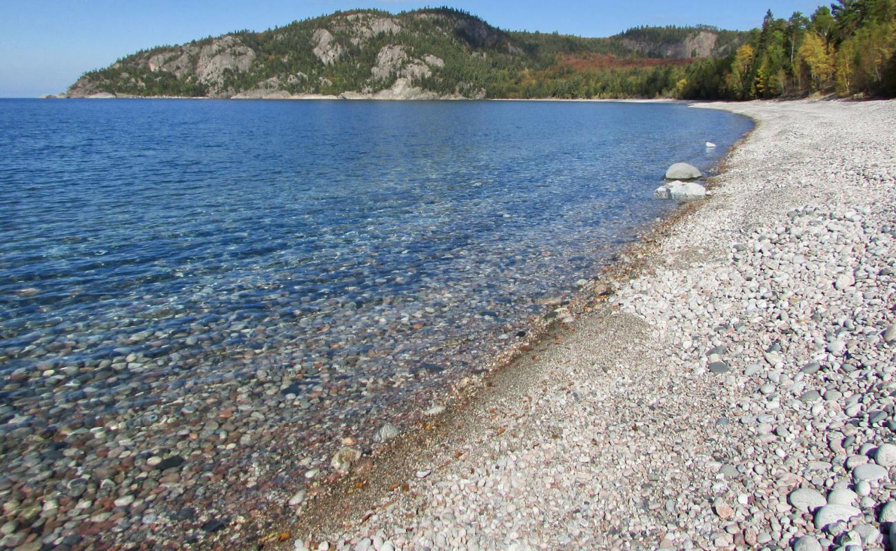 Photo of Alona Bay with rocks cover surface