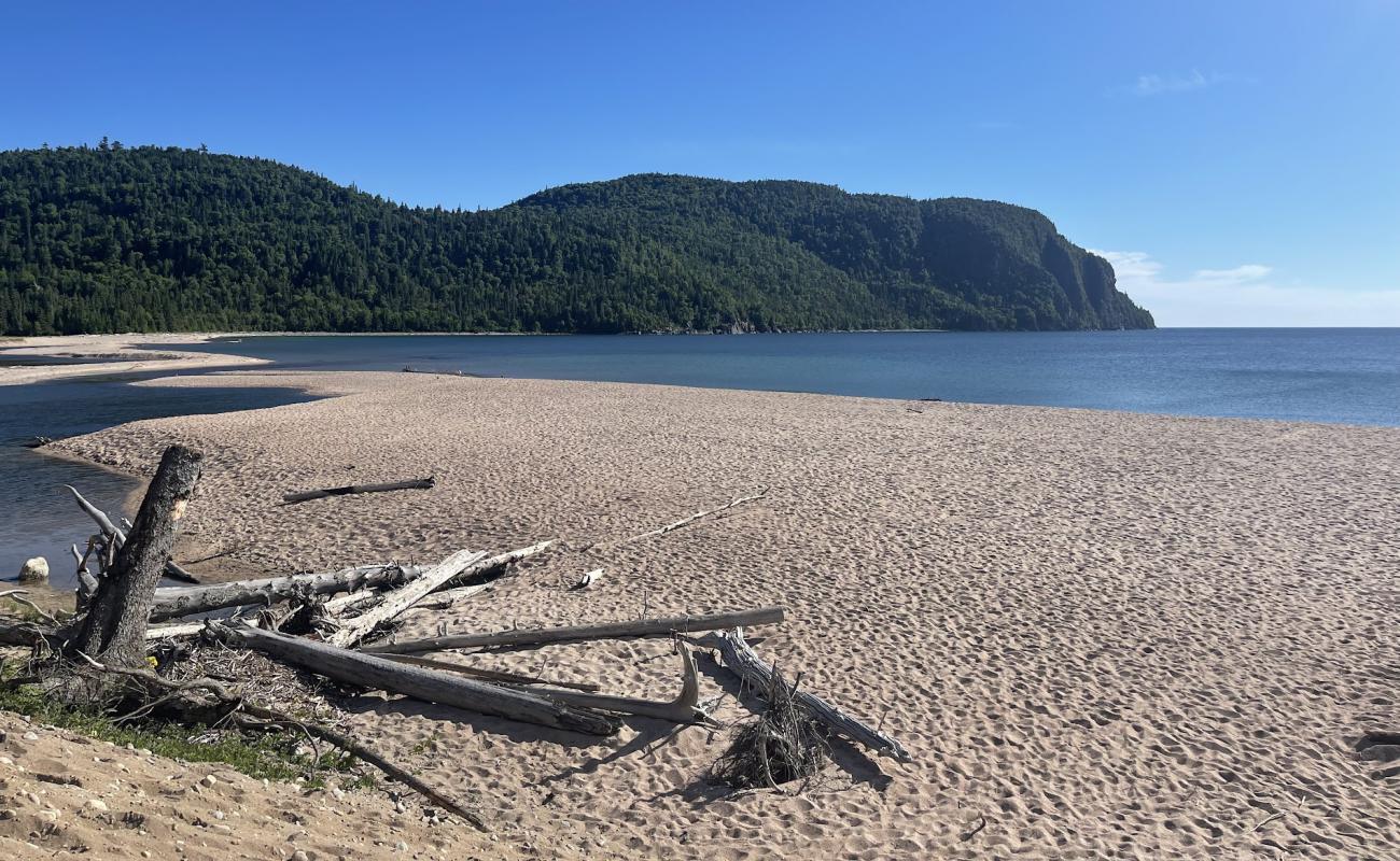 Photo of Old Woman Bay with bright sand surface