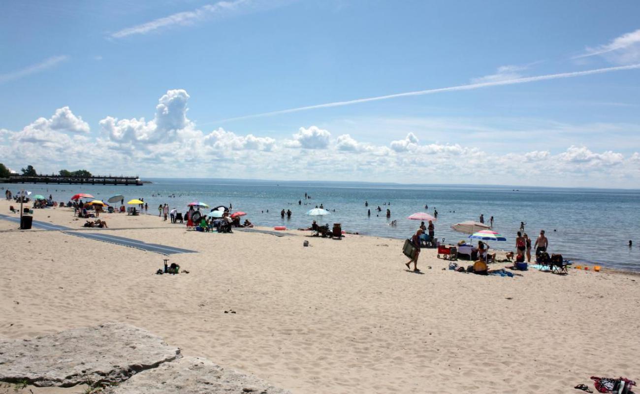 Photo of Bay Beach with bright sand surface