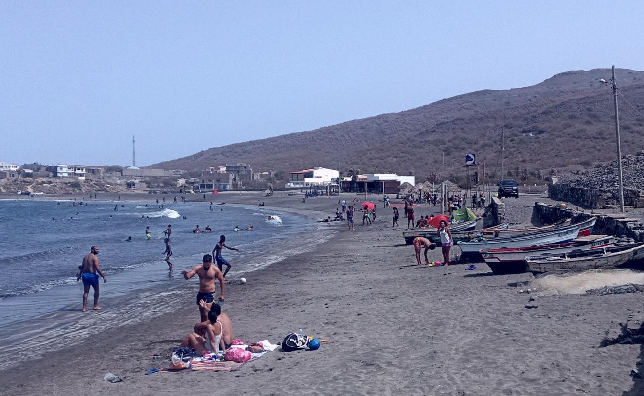 Photo of Praia Baixo with gray sand surface