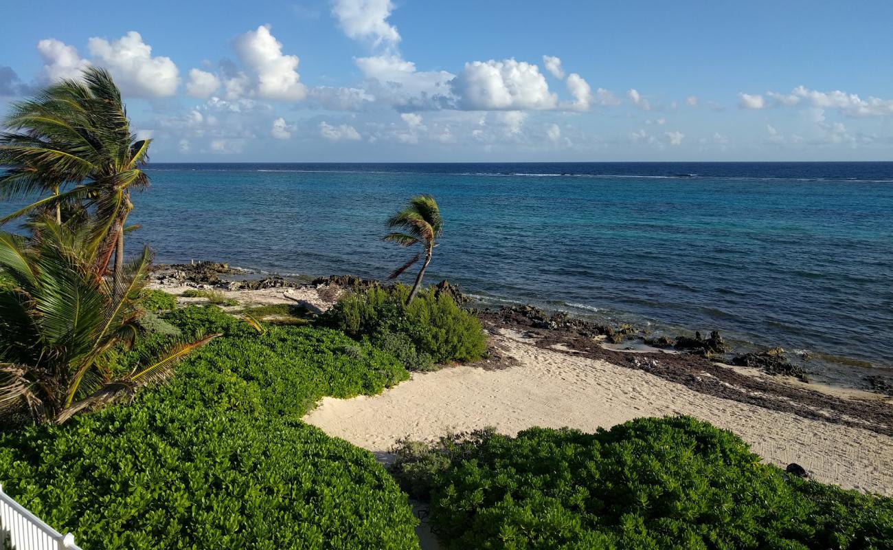 Photo of Caiman Kai beach with bright sand surface