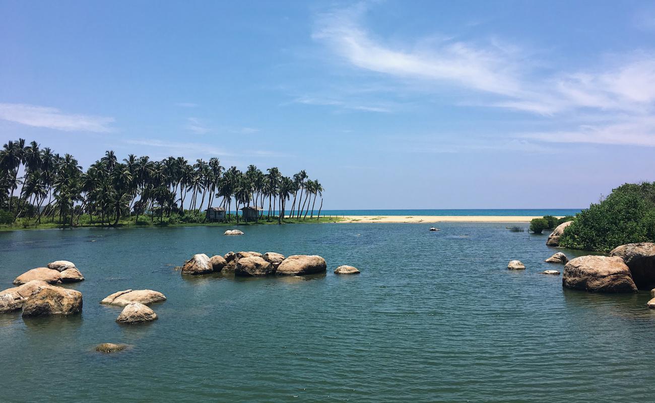 Photo of Komari Beach with bright sand surface