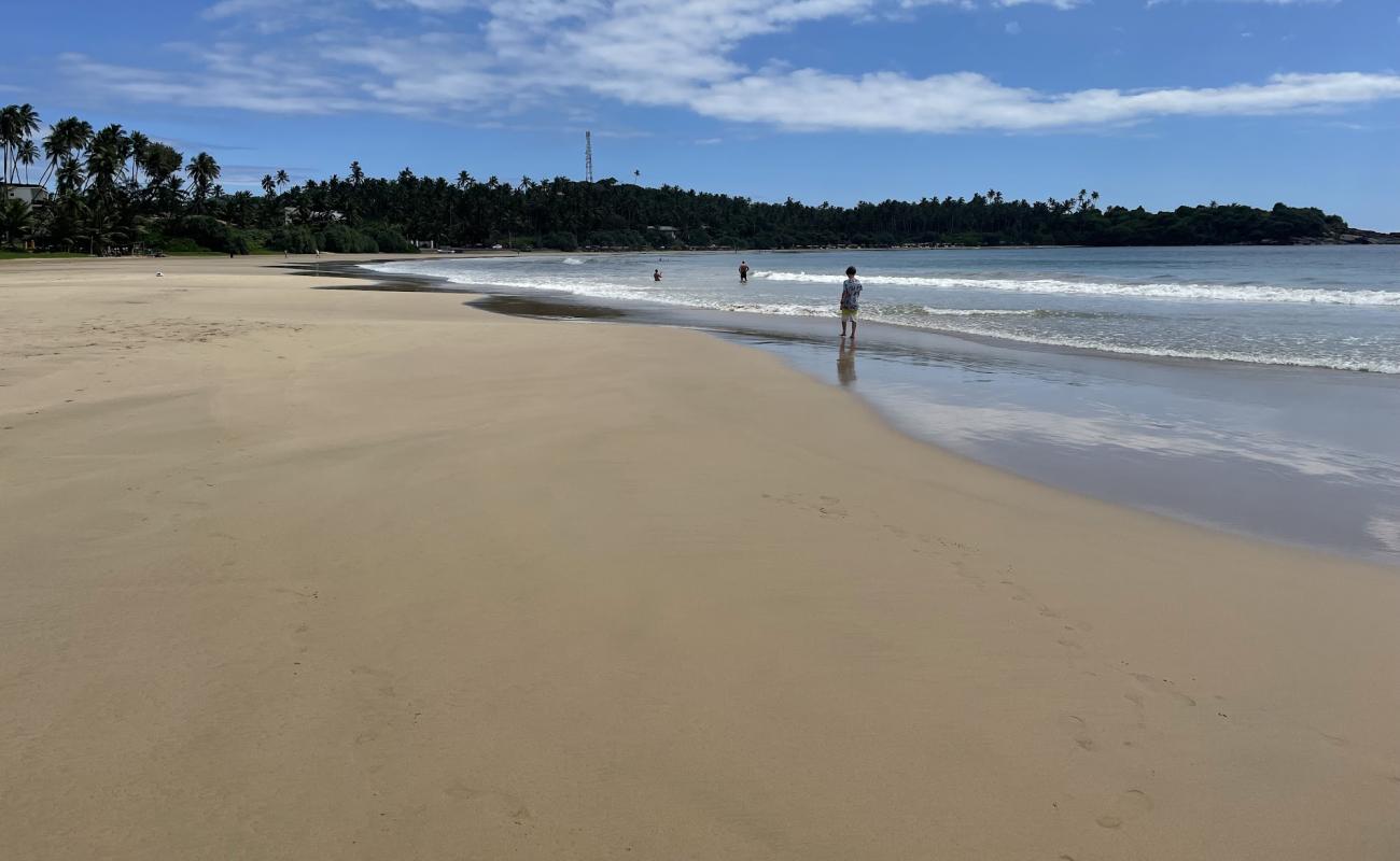 Photo of Dickwella Beach with bright fine sand surface