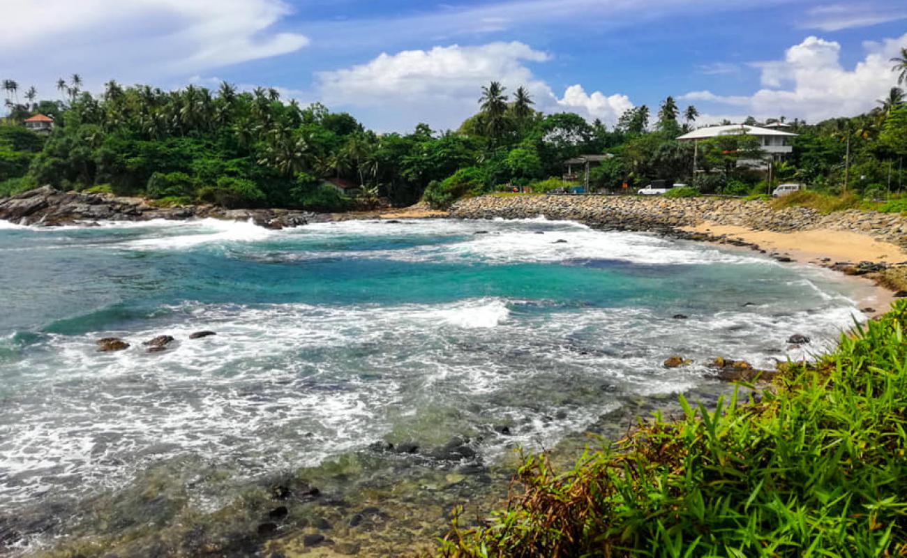 Photo of Seethagalla Beach with bright sand & rocks surface