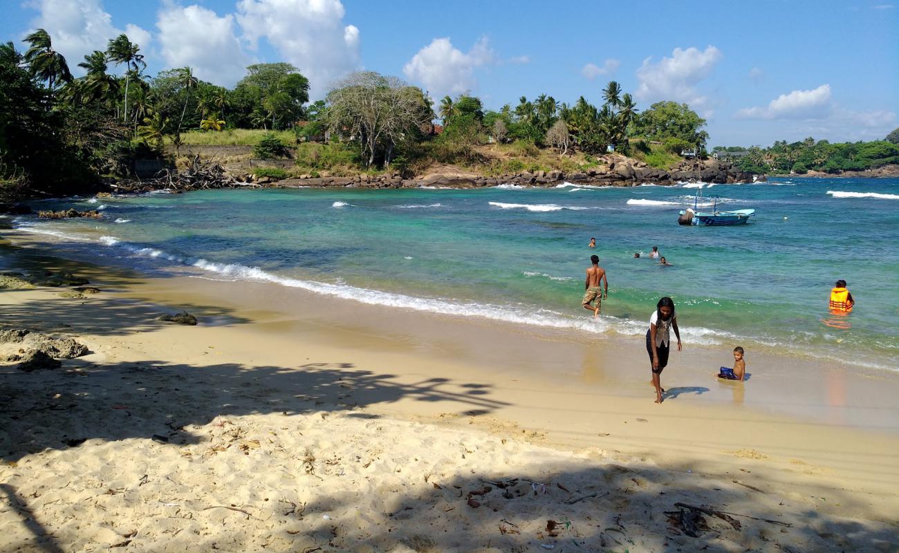 Photo of Beach of Devinuwara with bright sand surface