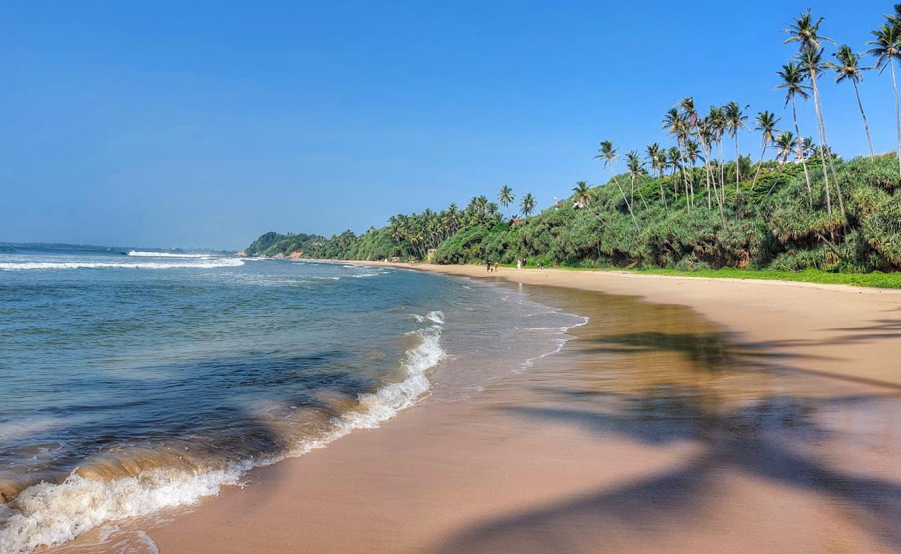 Photo of Lakshawaththa Beach with bright fine sand surface