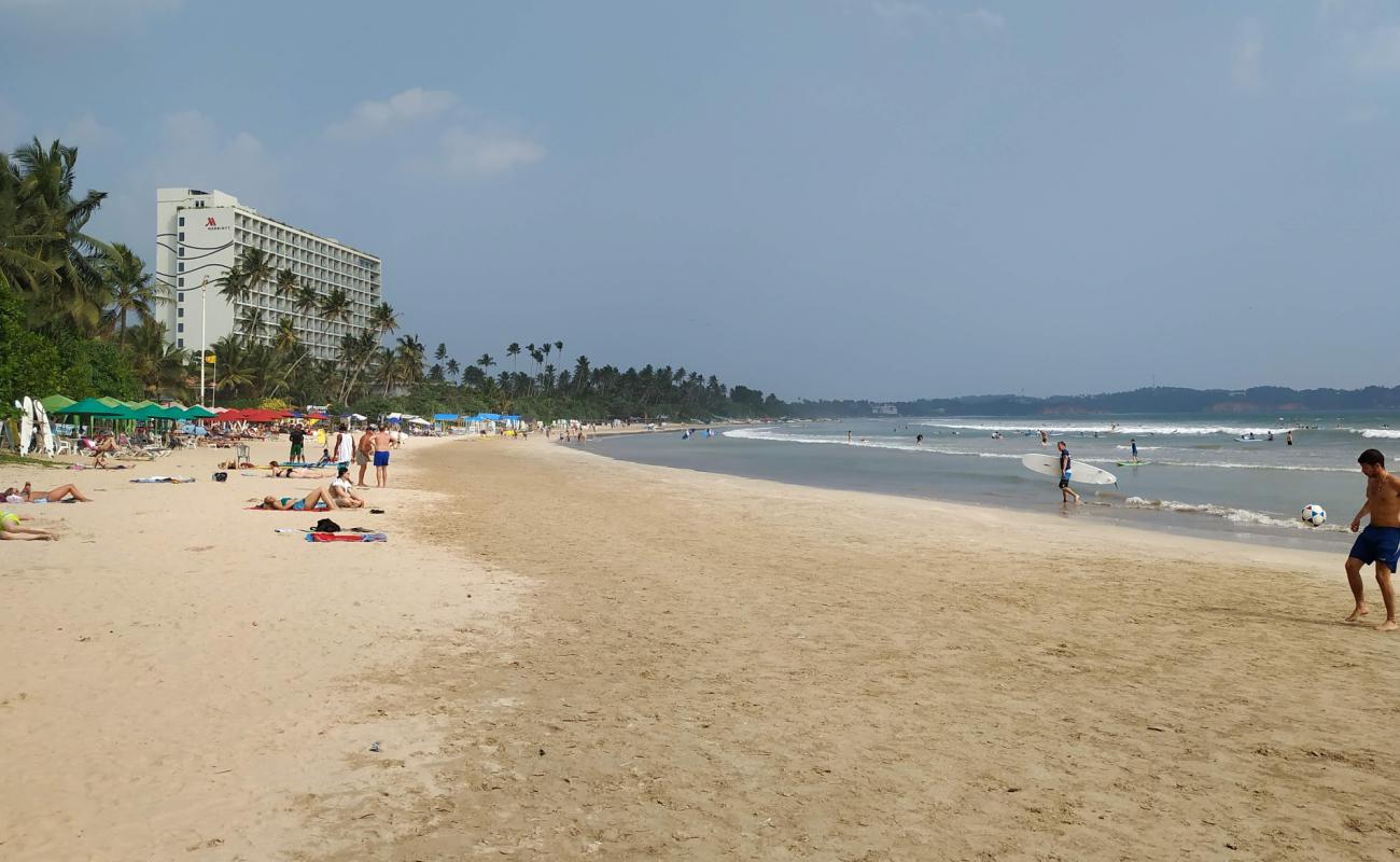 Photo of Weligama Bay Beach with bright sand surface