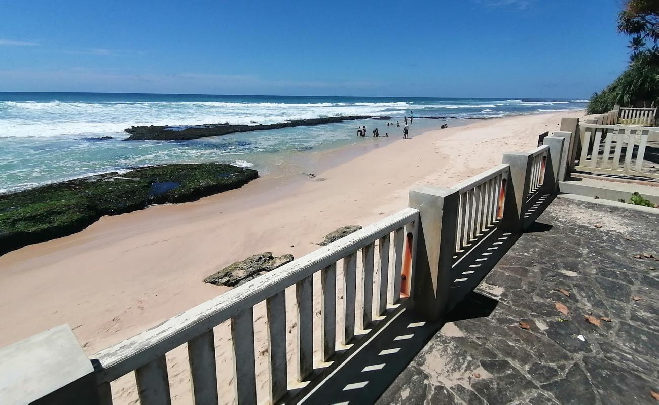 Photo of Besama Natural Pool Beach with bright sand & rocks surface