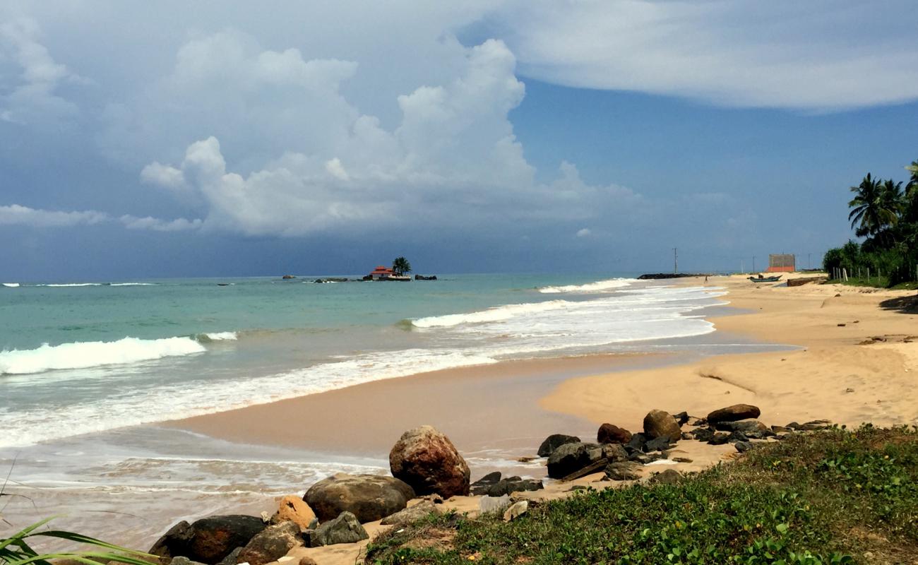 Photo of Seenigama beach with bright sand surface