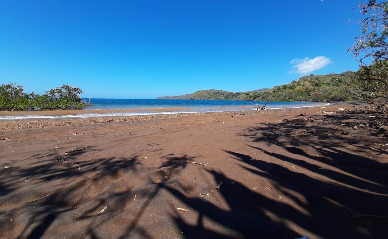 Photo of Iloni Beach with brown sand surface