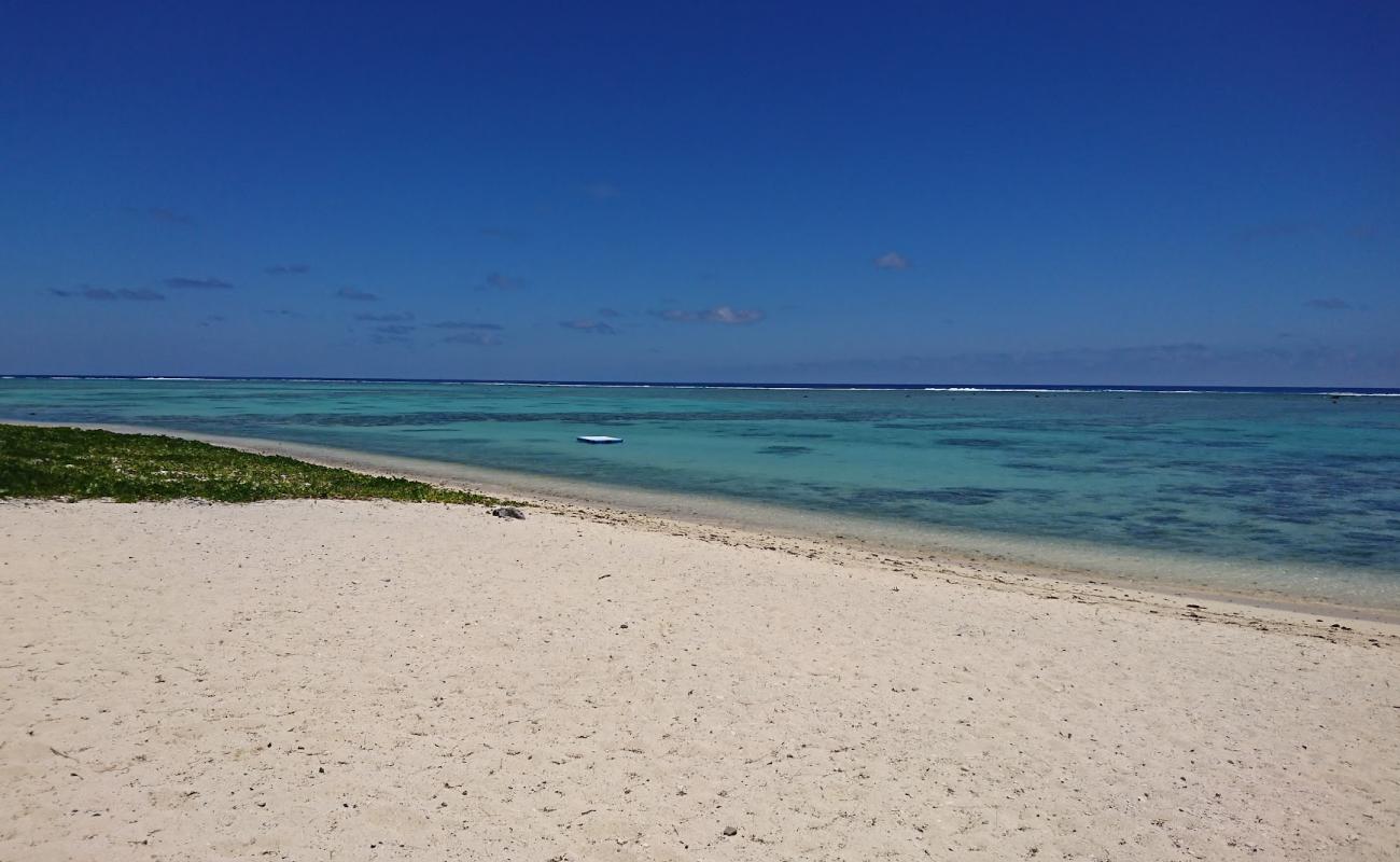 Photo of Nikao Beach with bright sand surface