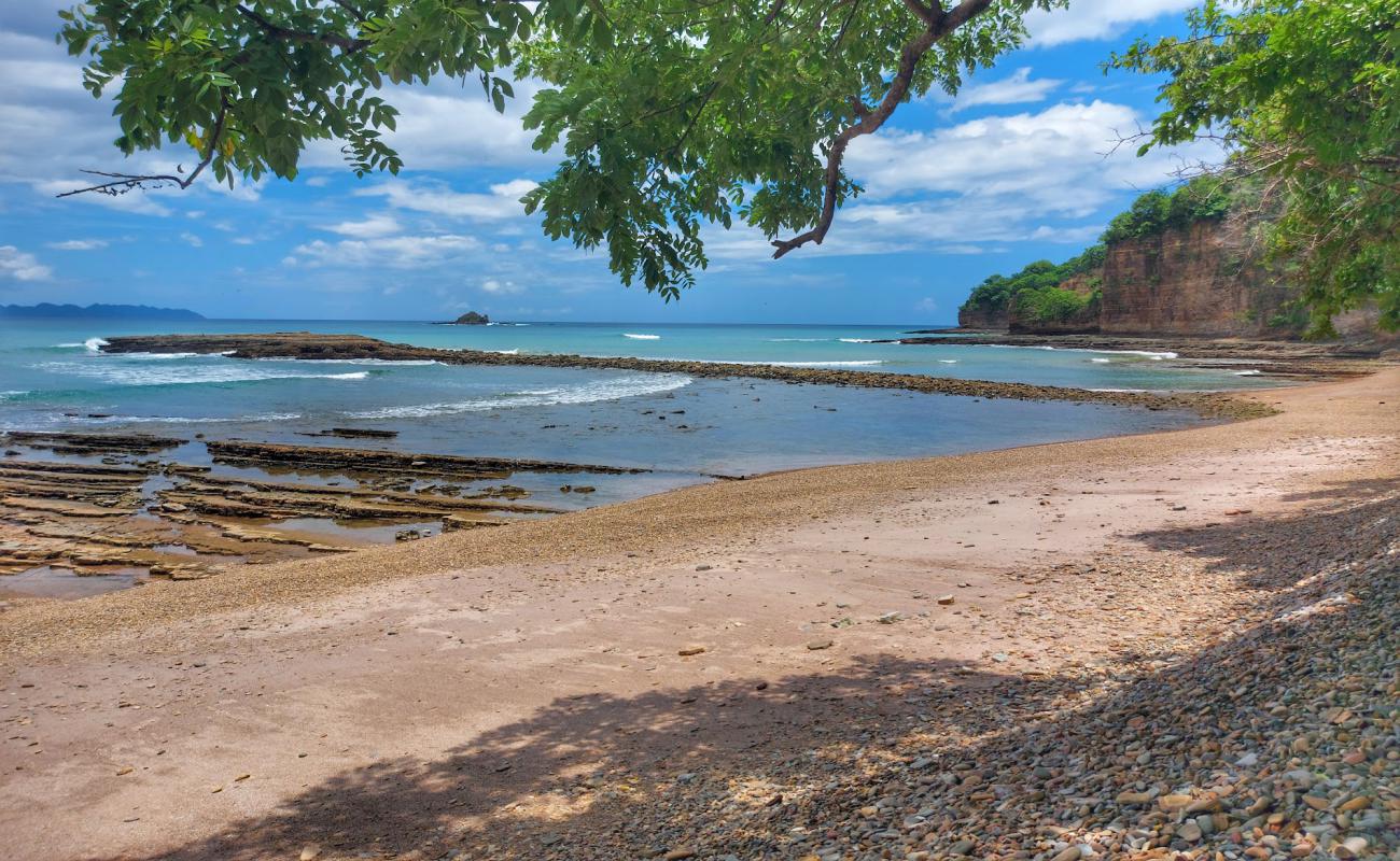 Photo of Punta Julian beach with gray pebble surface