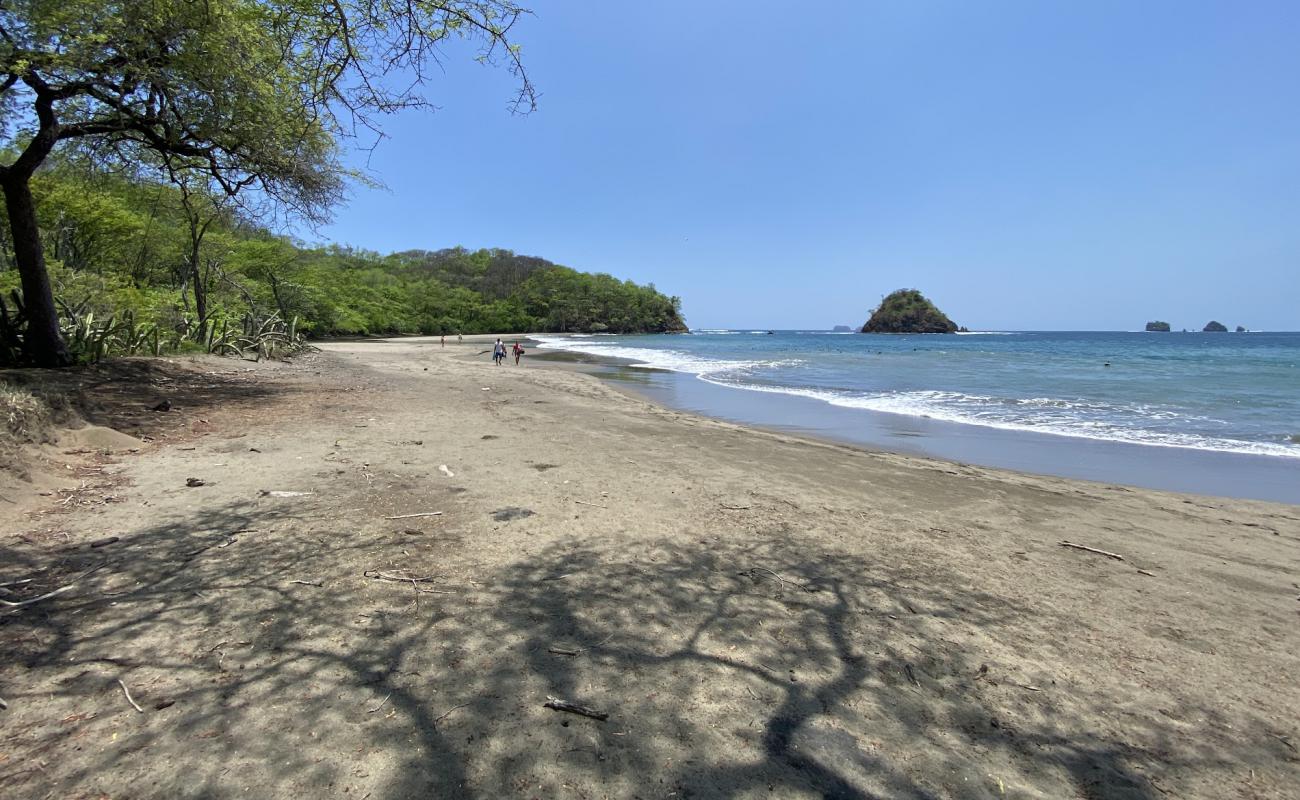 Photo of Playa Grande with gray sand surface