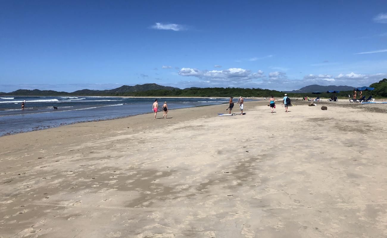 Photo of Tamarindo Beach with bright sand surface