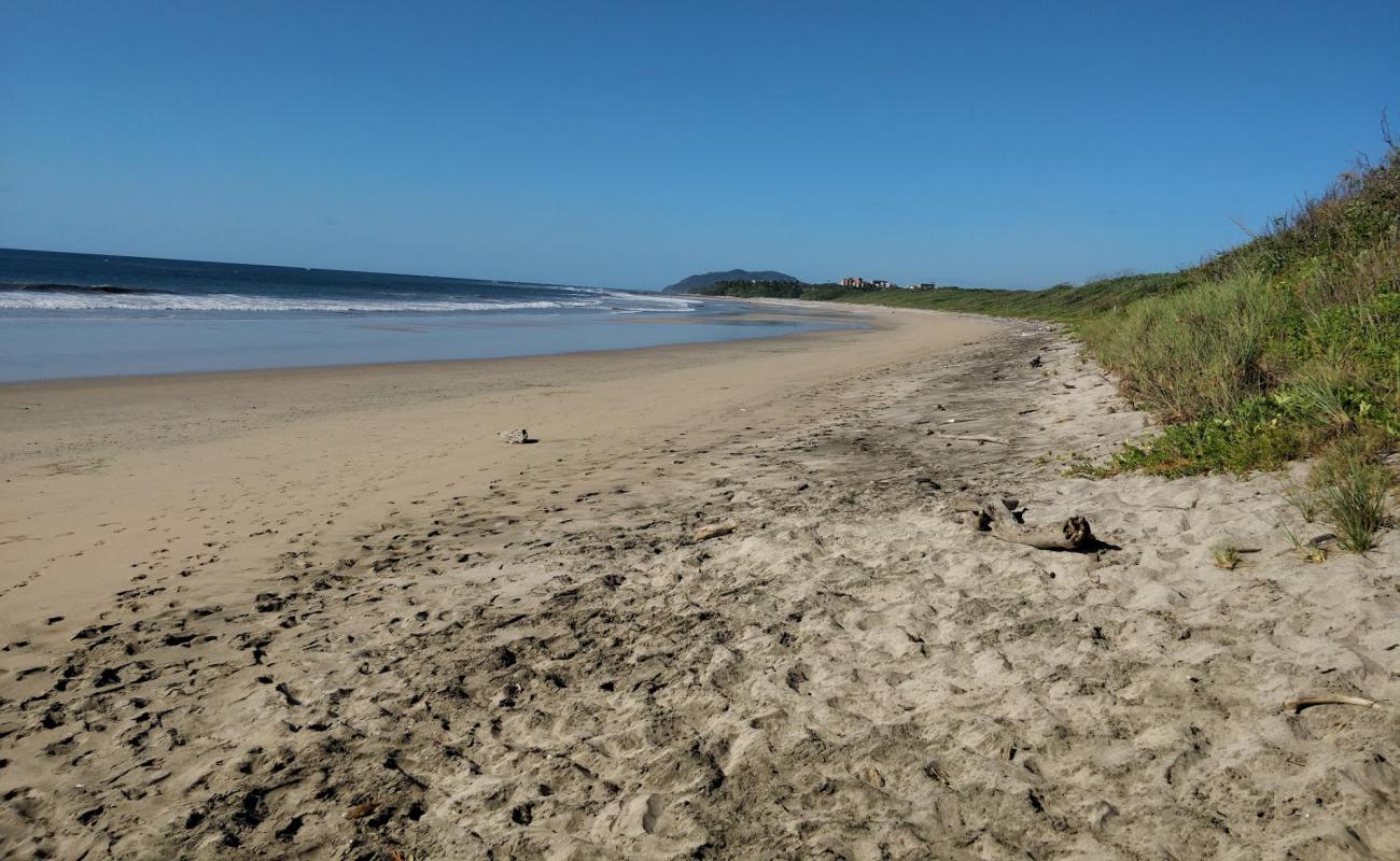 Photo of Langosta Beach with bright sand surface