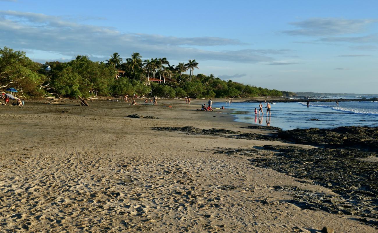 Photo of Black Beach with gray sand &  rocks surface