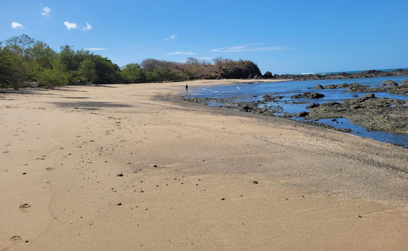 Photo of Playa Callejones with bright sand & rocks surface