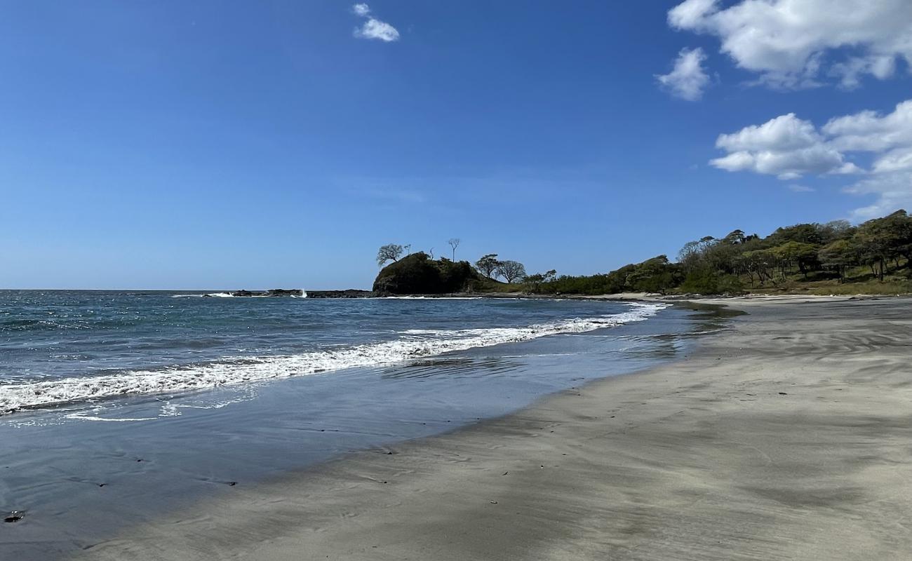 Photo of Pitahaya Beach with gray sand &  rocks surface