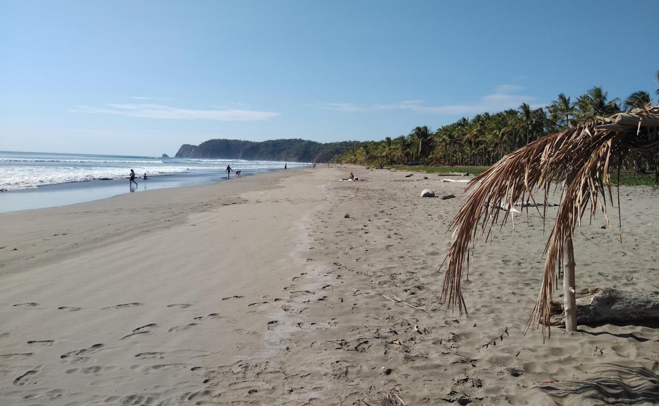 Photo of San Miguel Beach with bright sand surface