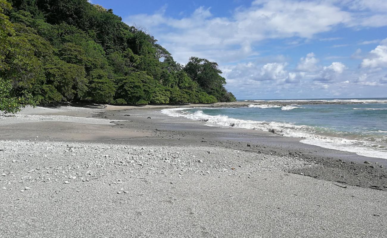 Photo of Playa Divina with bright sand & rocks surface