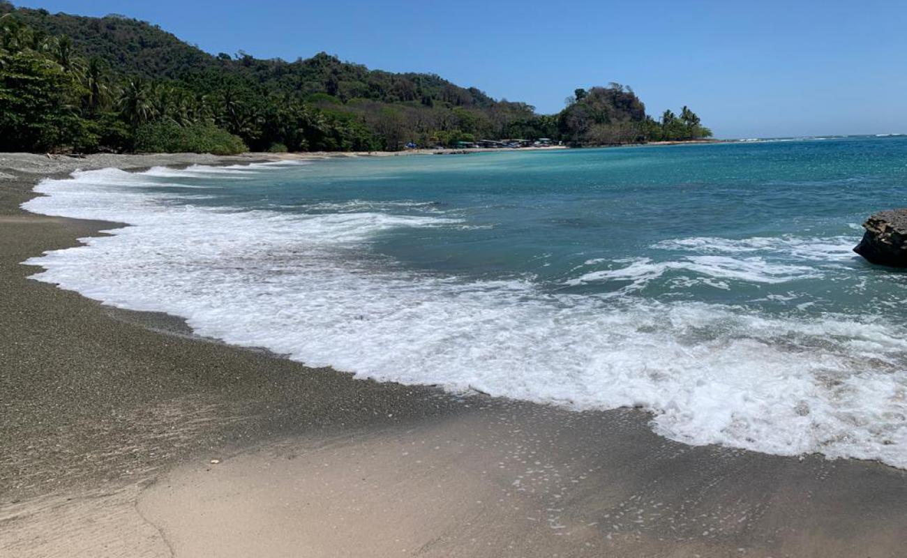 Photo of Mal Pais Beach with bright sand & rocks surface