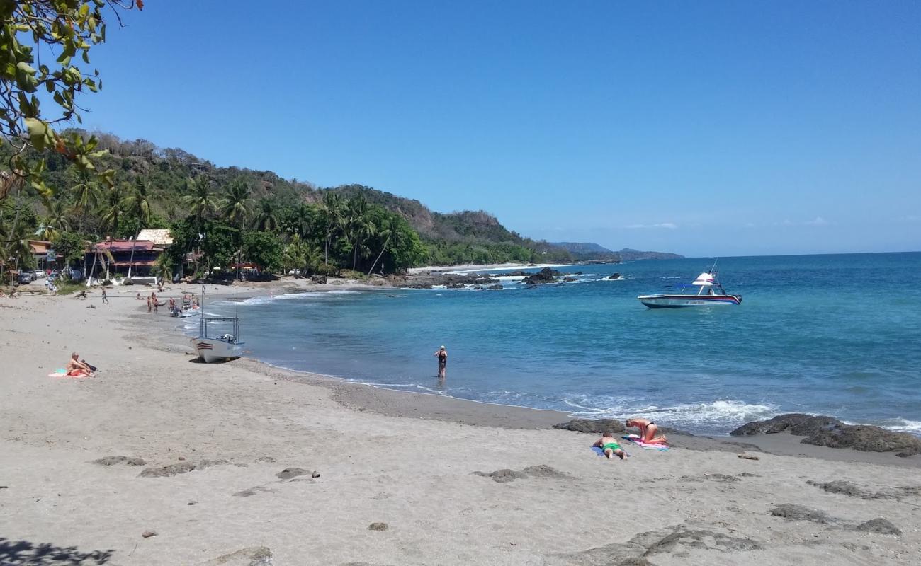 Photo of Montezuma Beach with bright sand surface