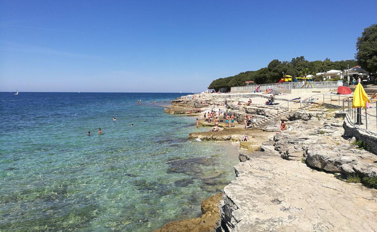 Photo of Lanterna II beach with brown pebble surface