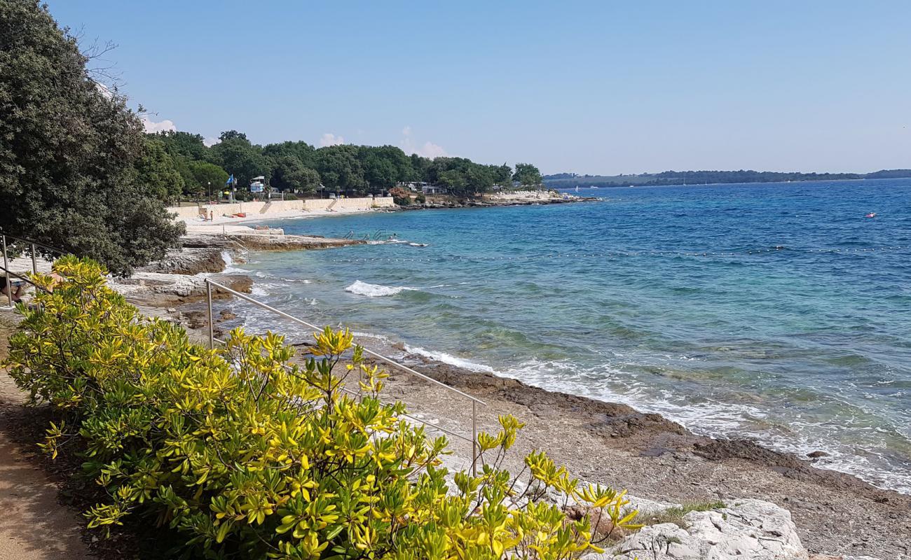 Photo of Solaris beach with rocks cover surface