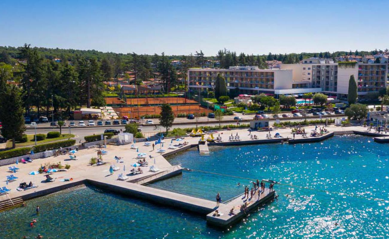 Photo of Porec beach with concrete cover surface