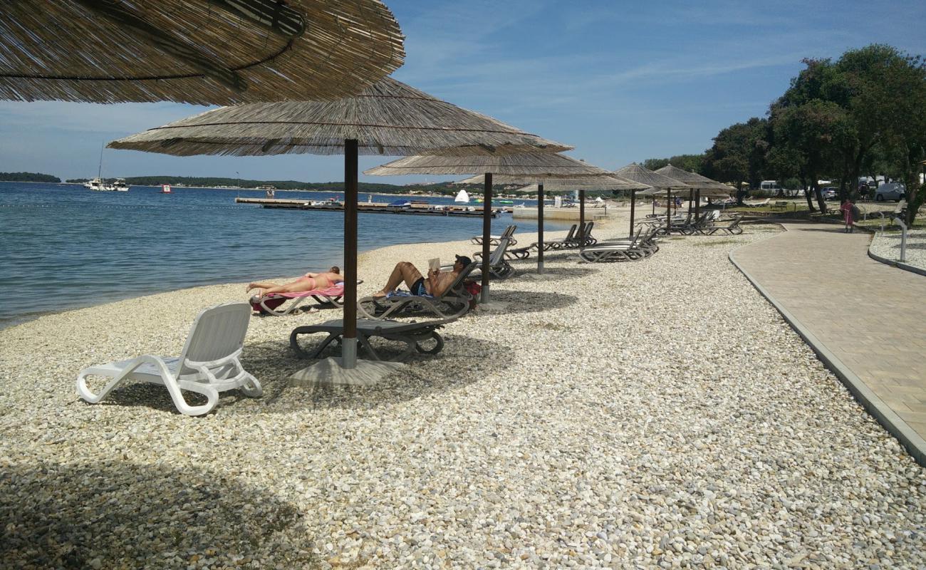 Photo of Val Saline beach with light fine pebble surface