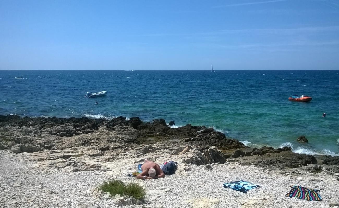 Photo of Punta Križ beach with rocks cover surface