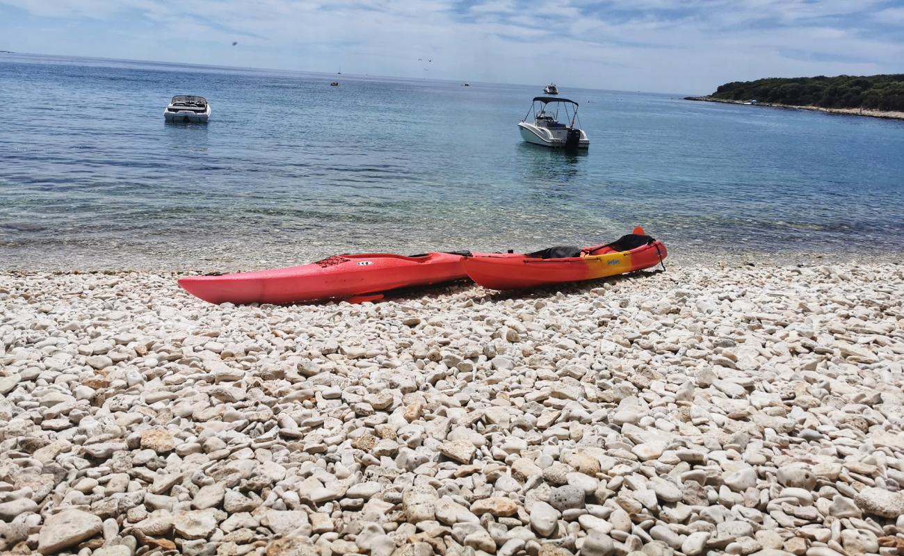 Photo of Luna beach with white pebble surface