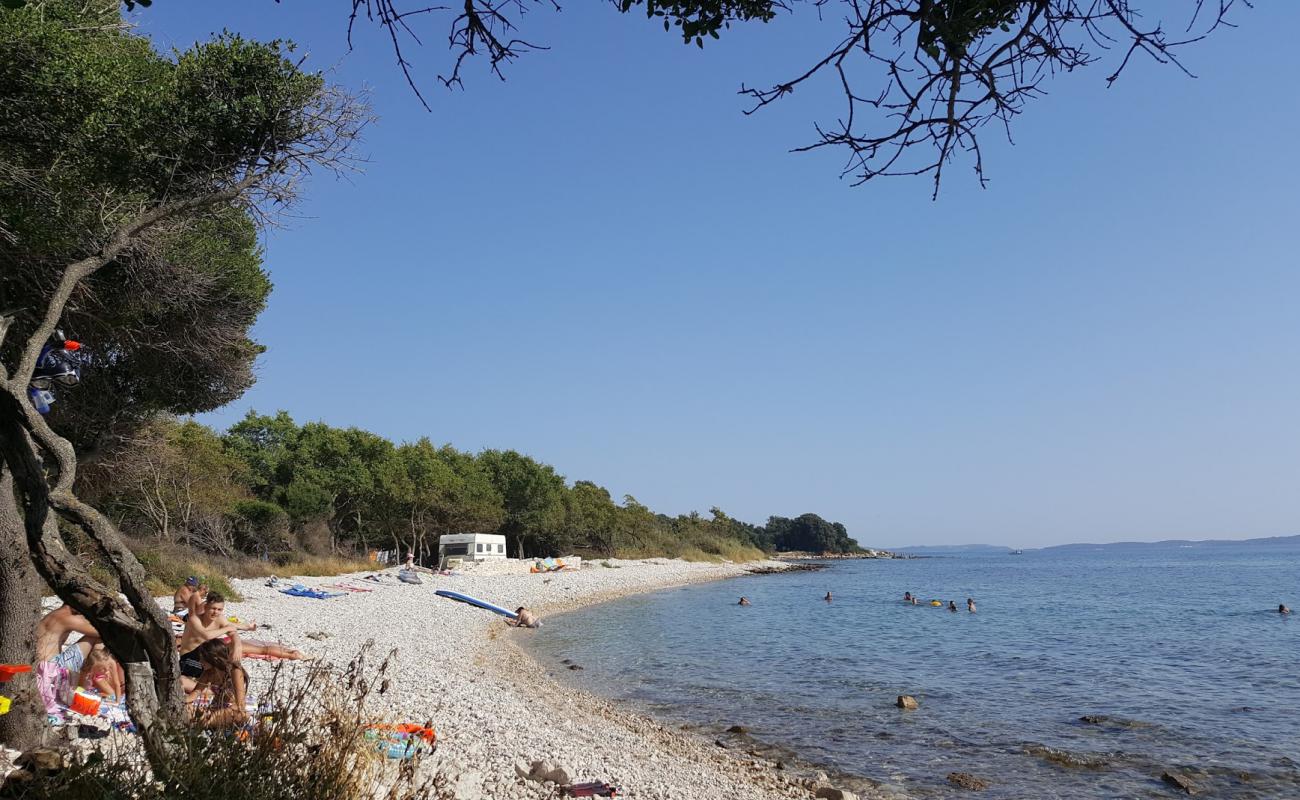 Photo of Maris beach with rocks cover surface