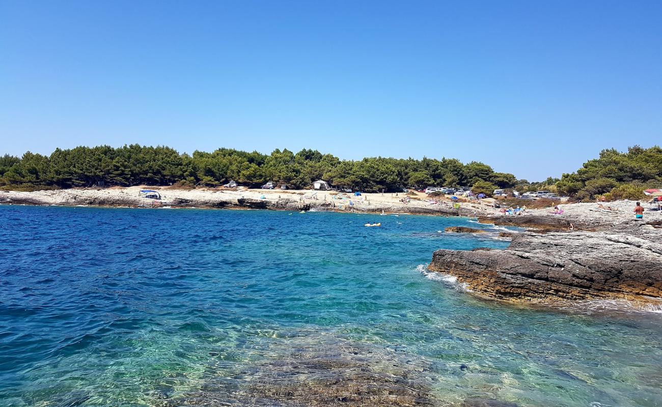 Photo of Toreta beach with rocks cover surface