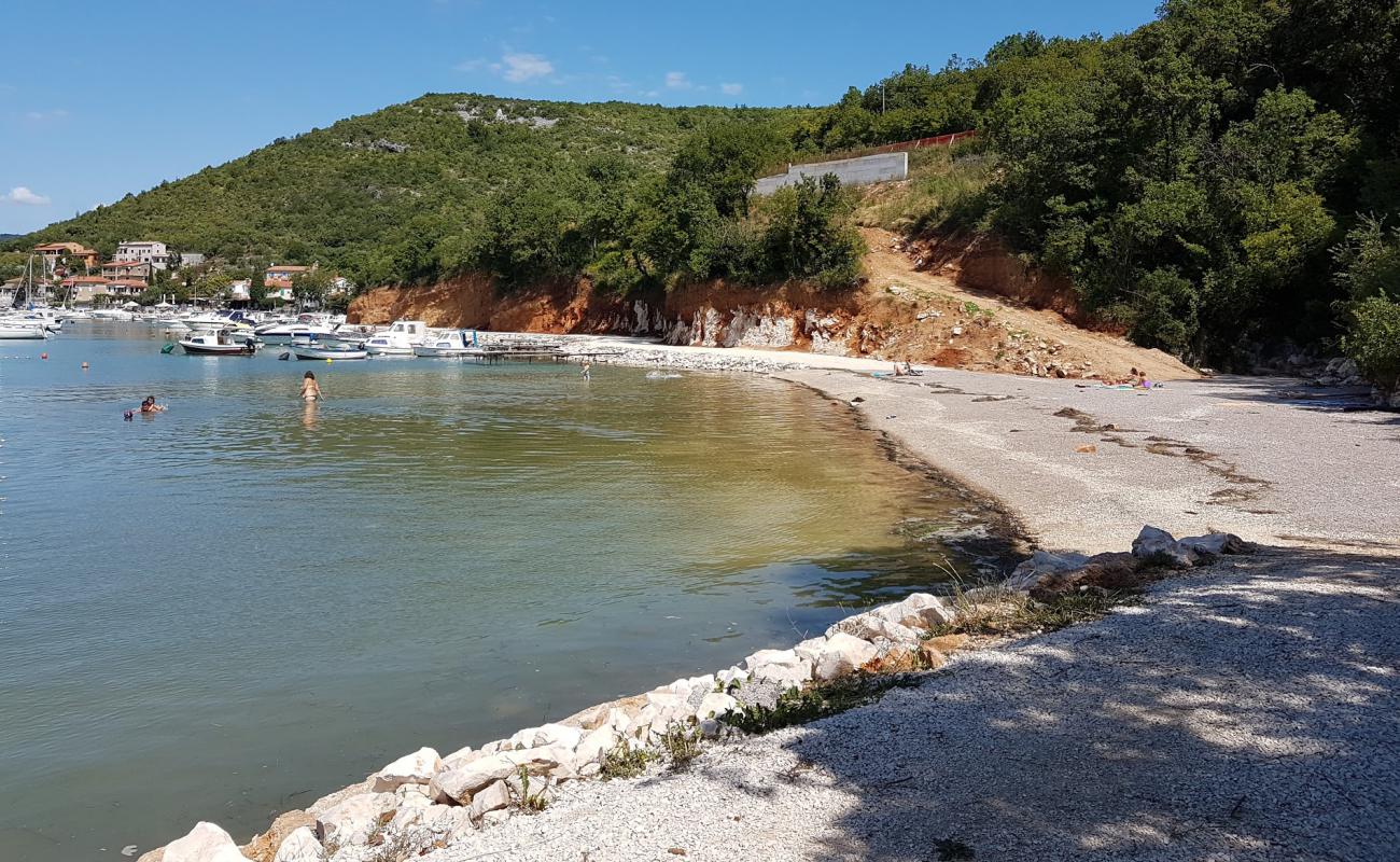 Photo of Get beach with brown fine pebble surface