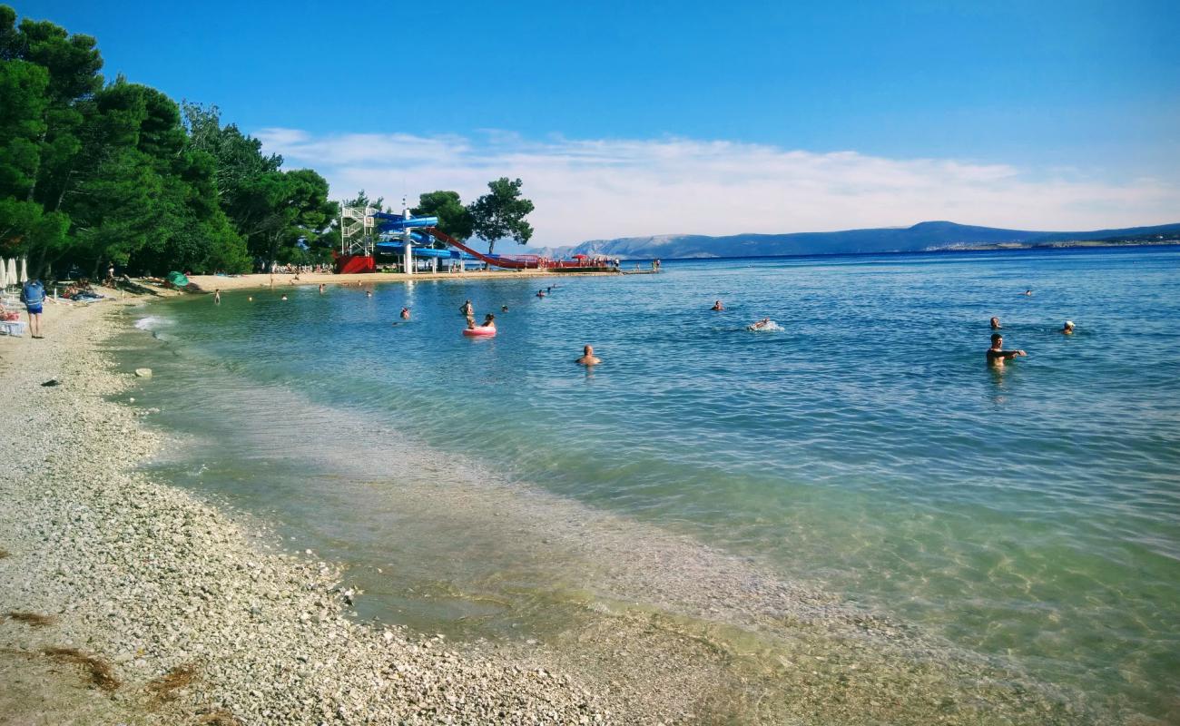 Photo of Neptun beach with light pebble surface