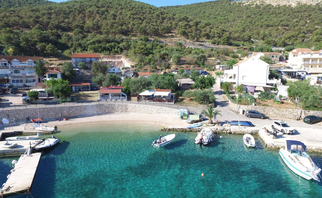 Photo of Legend beach with light fine pebble surface