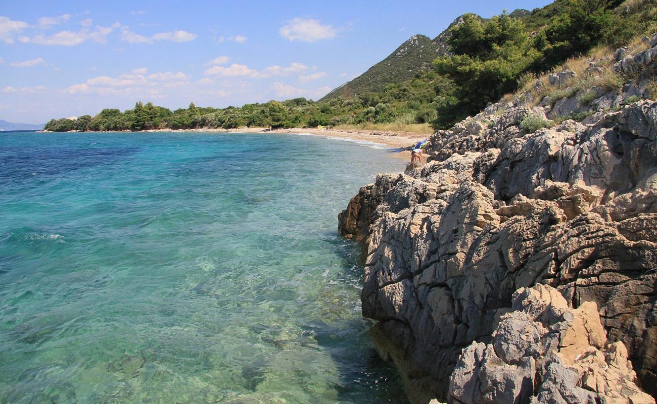 Photo of Salpa beach with brown pebble surface