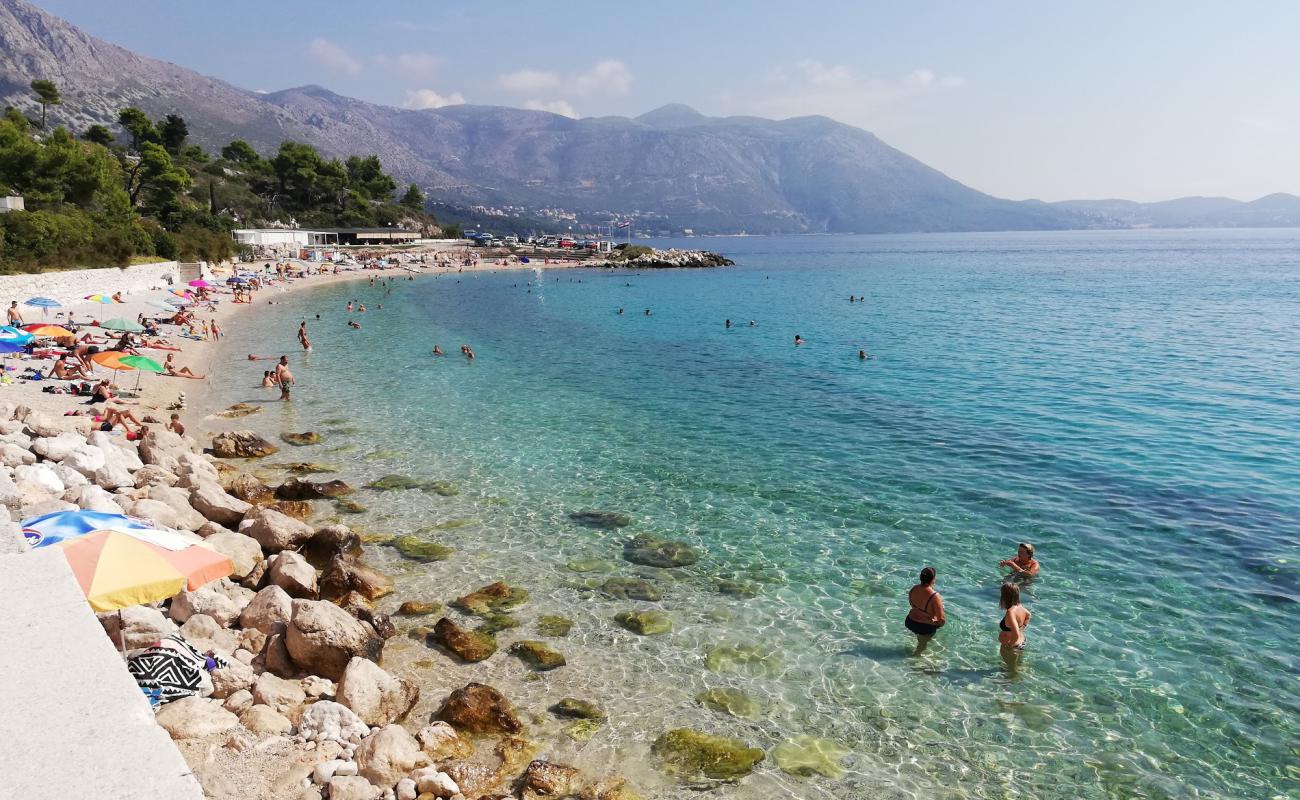 Photo of Kupari beach with light fine pebble surface