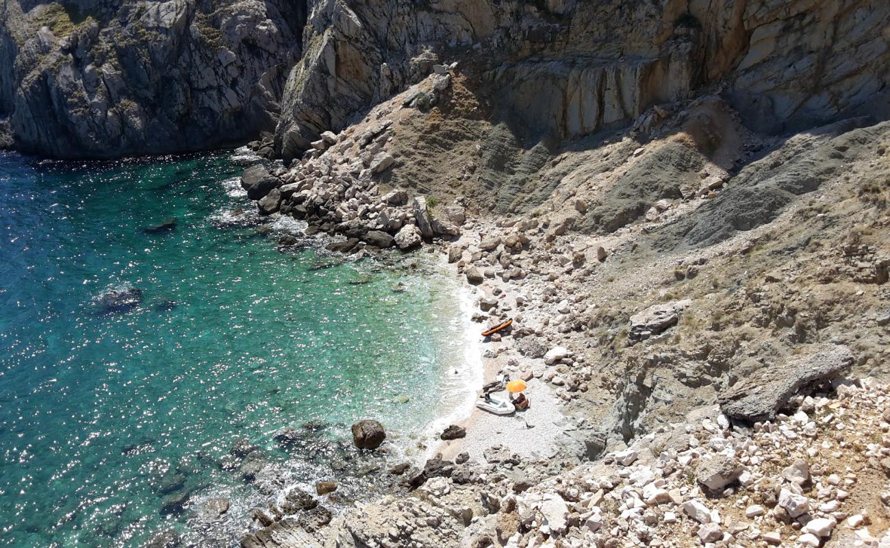 Photo of Skrinjica beach with rocks cover surface