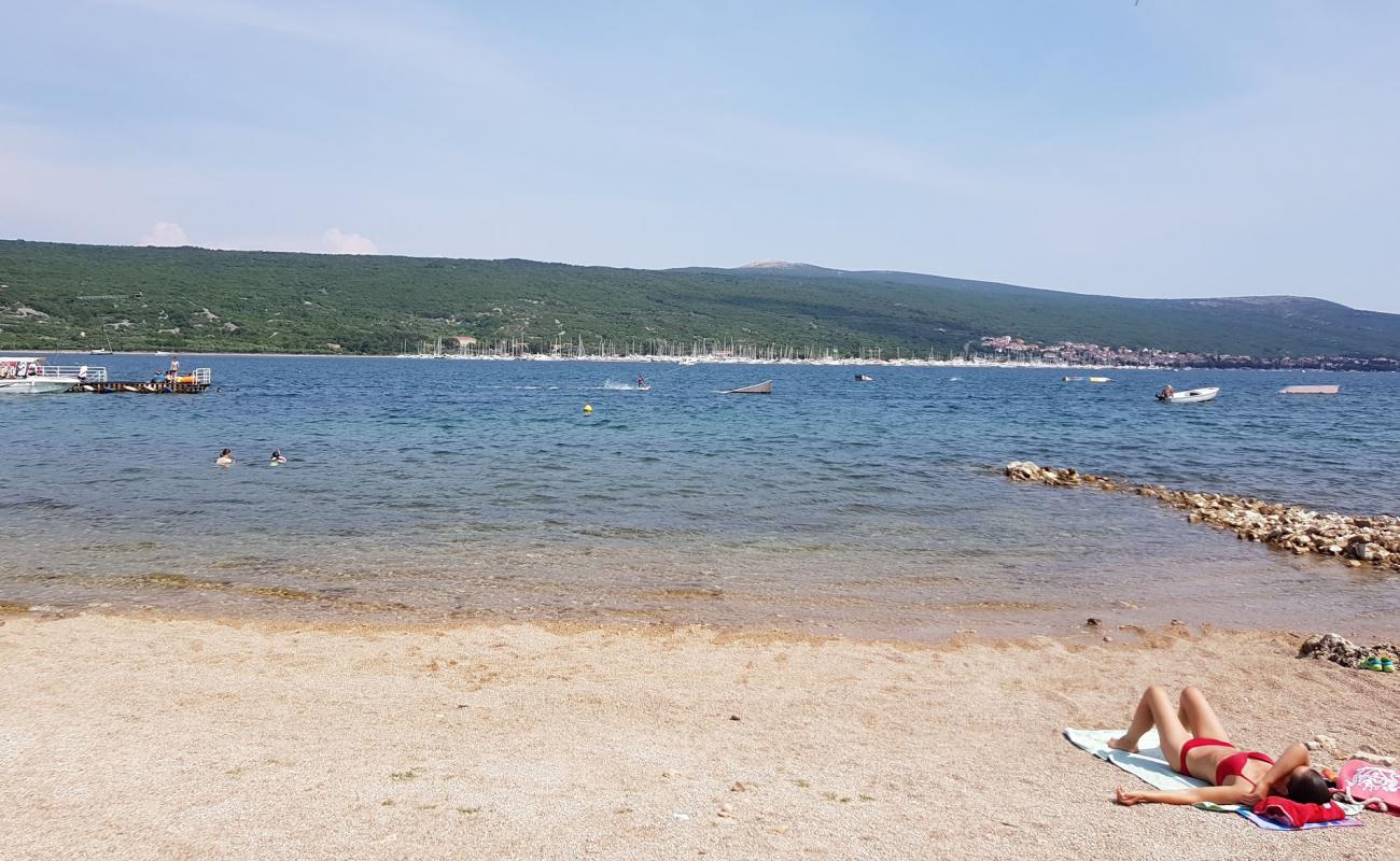 Photo of Punat beach with light pebble surface