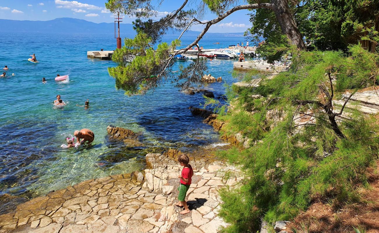 Photo of Paradise beach with light fine pebble surface