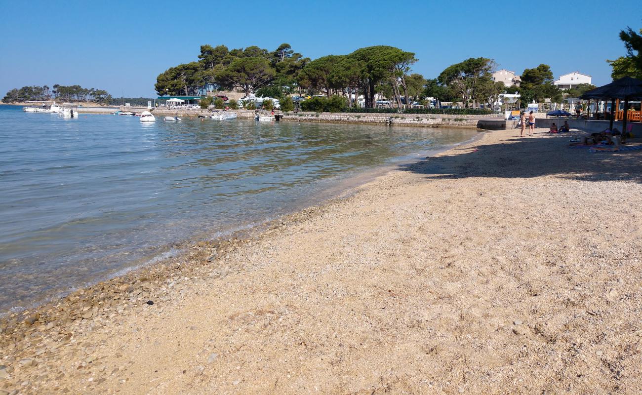 Photo of Padova beach with bright sand surface