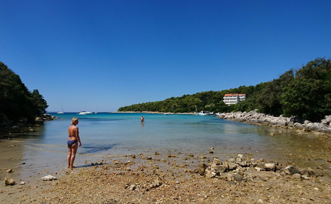 Photo of Gozinka beach with bright sand & rocks surface