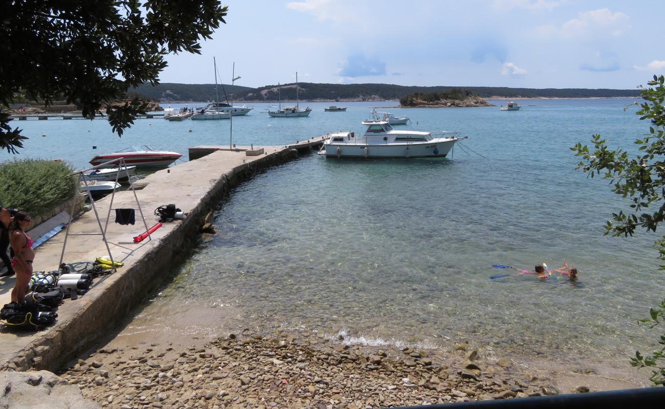 Photo of Gonar beach with bright sand & rocks surface