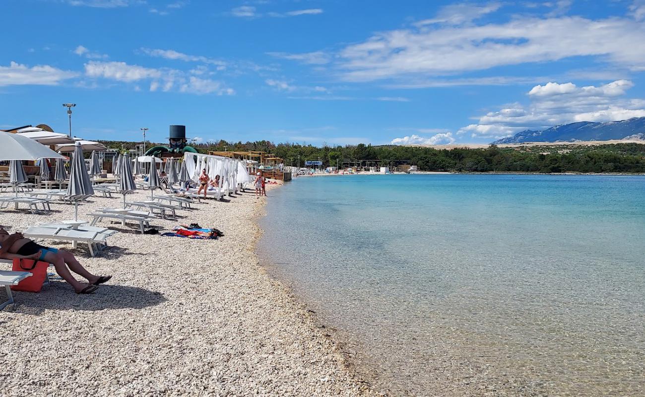 Photo of Zrce beach with light fine pebble surface